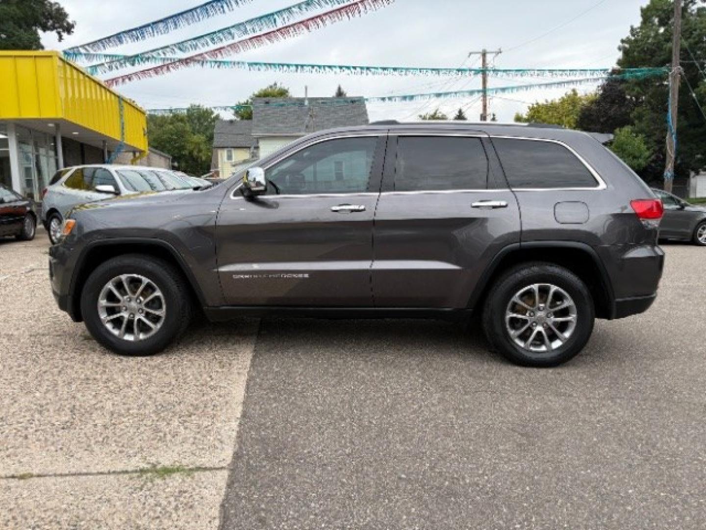 2014 Maximum Steel Metall Jeep Grand Cherokee Limited 4WD (1C4RJFBG0EC) with an 3.6L V6 DOHC 24V engine, 5-Speed Automatic transmission, located at 745 S Robert St, St. Paul, MN, 55107, (651) 222-2991, 44.923389, -93.081215- Photo#3