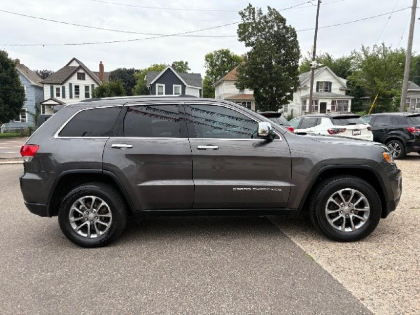 2014 Maximum Steel Metall Jeep Grand Cherokee Limited 4WD (1C4RJFBG0EC) with an 3.6L V6 DOHC 24V engine, 5-Speed Automatic transmission, located at 745 S Robert St, St. Paul, MN, 55107, (651) 222-2991, 44.923389, -93.081215- Photo#7