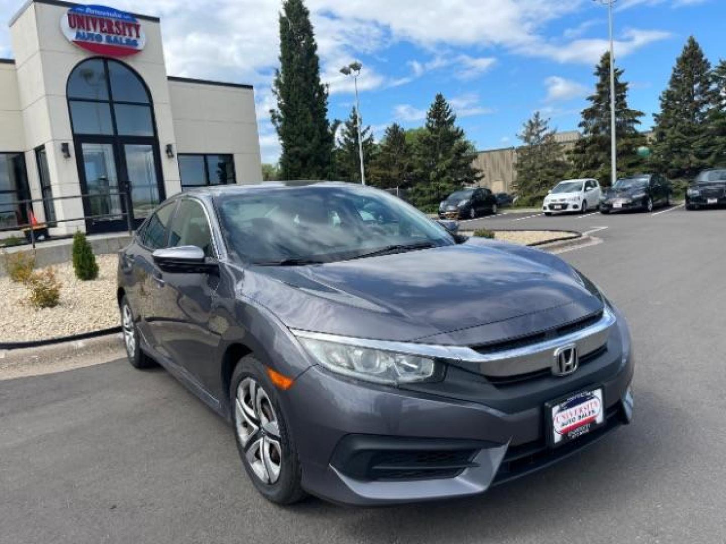 2016 GRAY Honda Civic LX Sedan 6MT (19XFC2E56GE) with an 2.0L L4 DOHC 16V engine, 6-Speed Manual transmission, located at 3301 W Hwy 13, Burnsville, MN, 55337, (952) 460-3200, 44.775333, -93.320808 - Photo#0