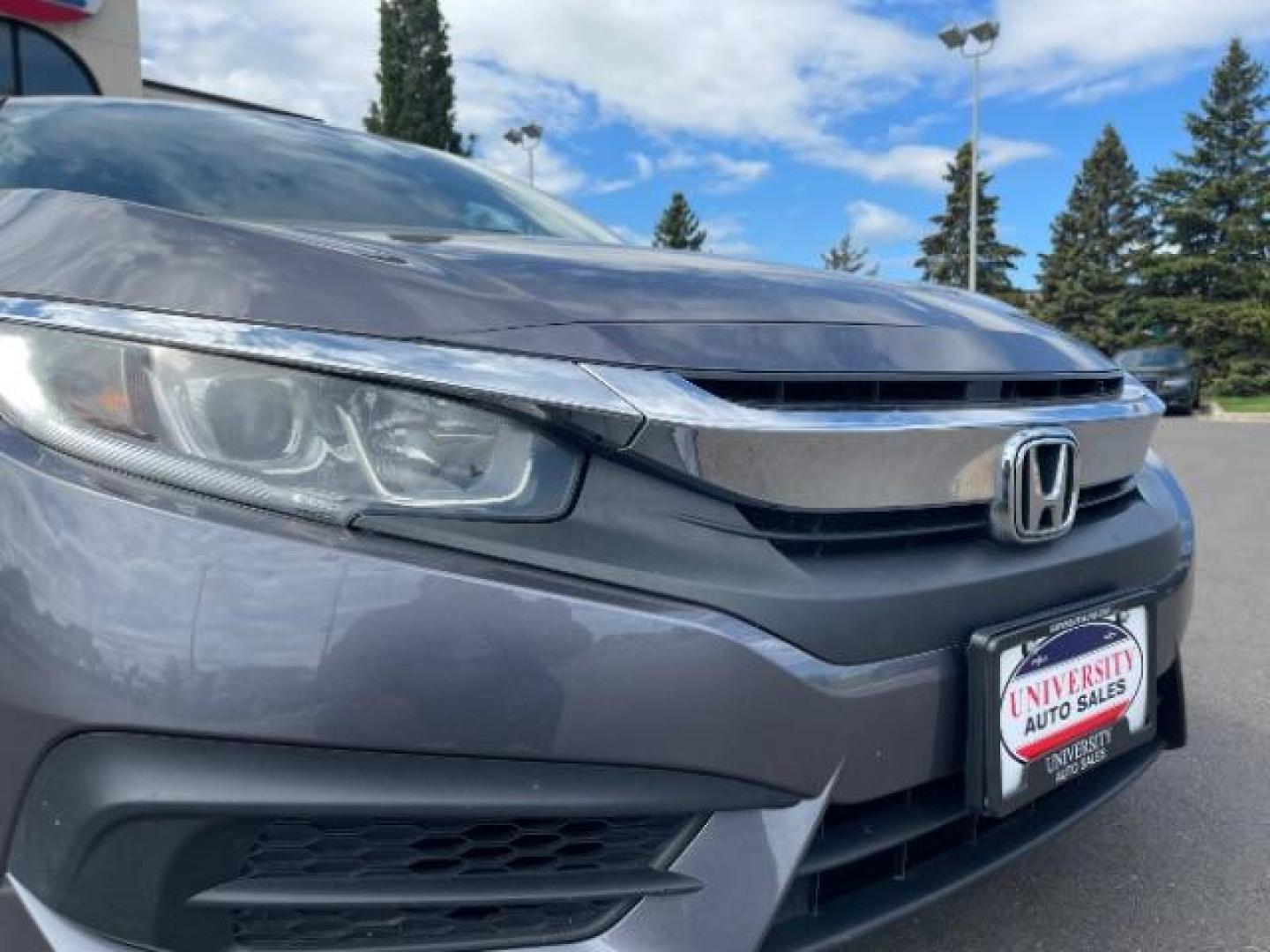 2016 GRAY Honda Civic LX Sedan 6MT (19XFC2E56GE) with an 2.0L L4 DOHC 16V engine, 6-Speed Manual transmission, located at 3301 W Hwy 13, Burnsville, MN, 55337, (952) 460-3200, 44.775333, -93.320808 - Photo#1