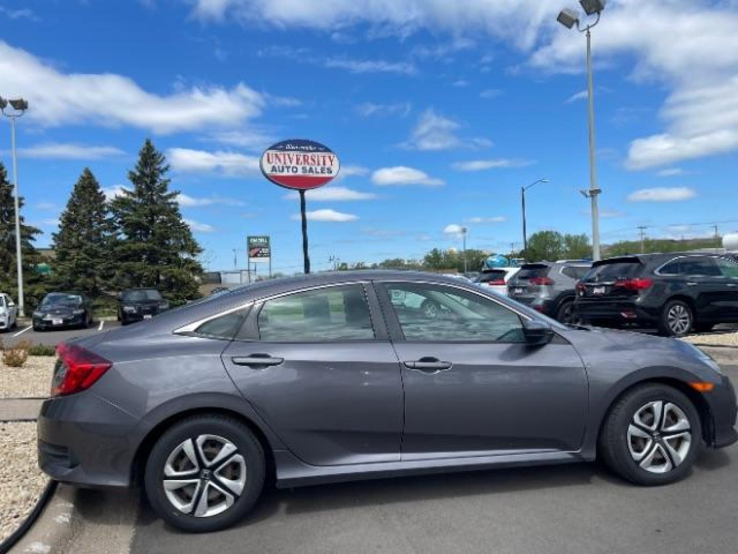 2016 GRAY Honda Civic LX Sedan 6MT (19XFC2E56GE) with an 2.0L L4 DOHC 16V engine, 6-Speed Manual transmission, located at 3301 W Hwy 13, Burnsville, MN, 55337, (952) 460-3200, 44.775333, -93.320808 - Photo#8