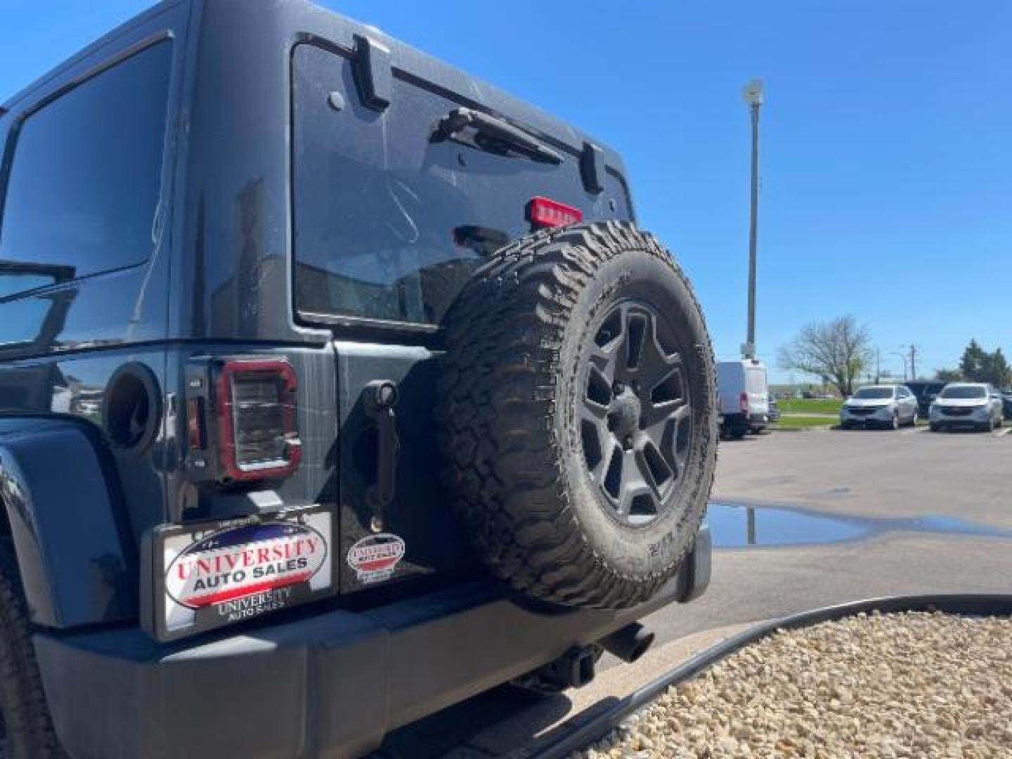 2017 Granite Crystal Metallic Clear Coat Jeep Wrangler Unlimited Rubicon 4WD (1C4HJWFG5HL) with an 3.6L V6 DOHC 24V FFV engine, located at 745 S Robert St, St. Paul, MN, 55107, (651) 222-2991, 44.923389, -93.081215 - Photo#26