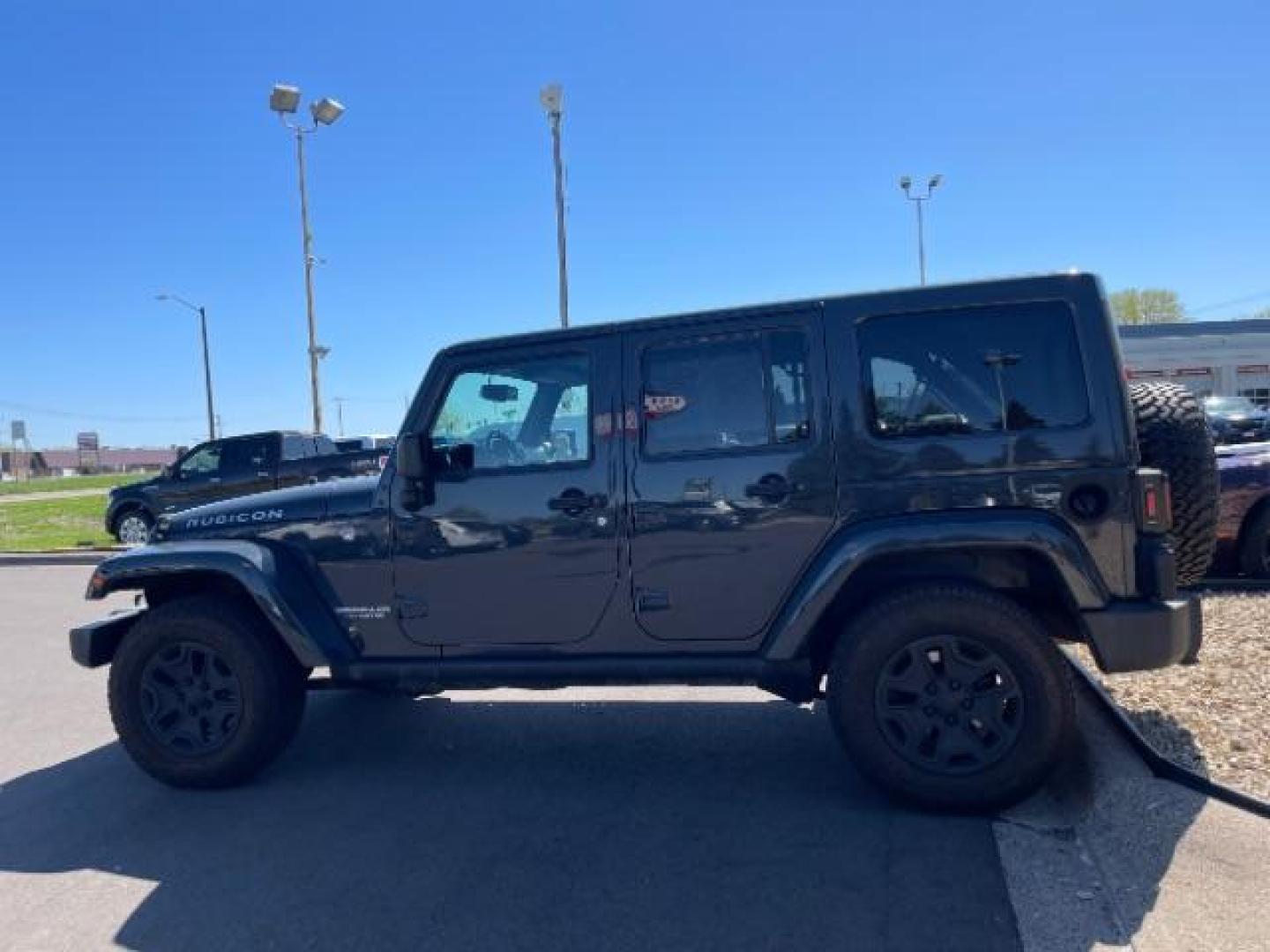 2017 Granite Crystal Metallic Clear Coat Jeep Wrangler Unlimited Rubicon 4WD (1C4HJWFG5HL) with an 3.6L V6 DOHC 24V FFV engine, located at 745 S Robert St, St. Paul, MN, 55107, (651) 222-2991, 44.923389, -93.081215 - Photo#4