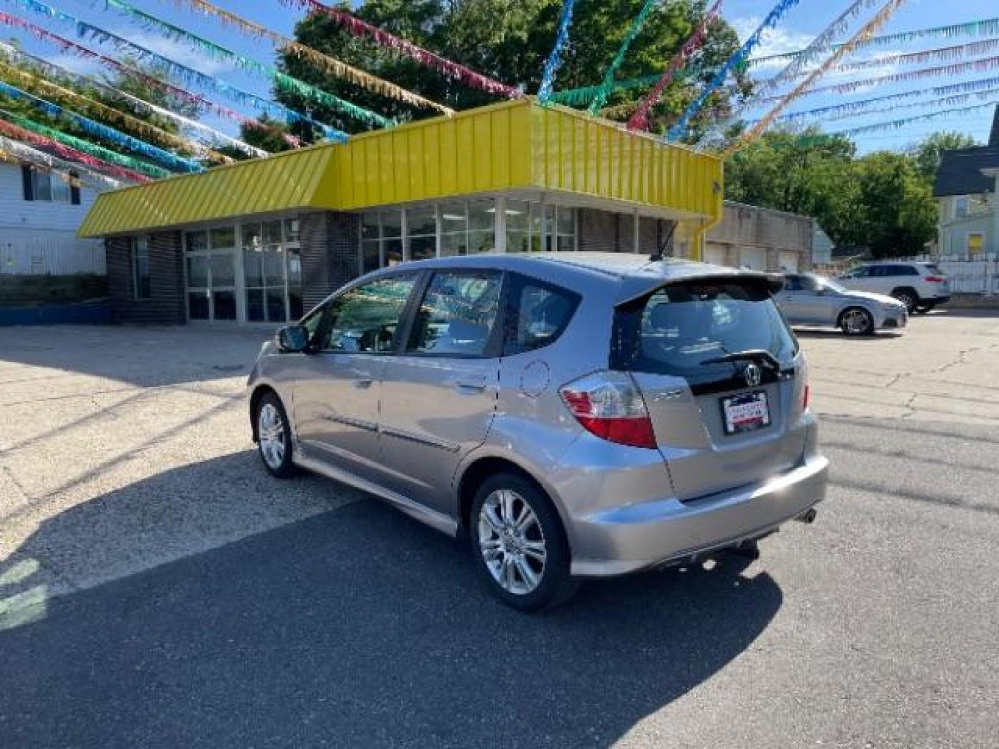 2010 Honda Fit Sport 5-Speed MT (JHMGE8G42AS) with an 1.5L L4 SOHC 16V engine, 5-Speed Manual transmission, located at 745 S Robert St, St. Paul, MN, 55107, (651) 222-2991, 44.923389, -93.081215 - Photo#2