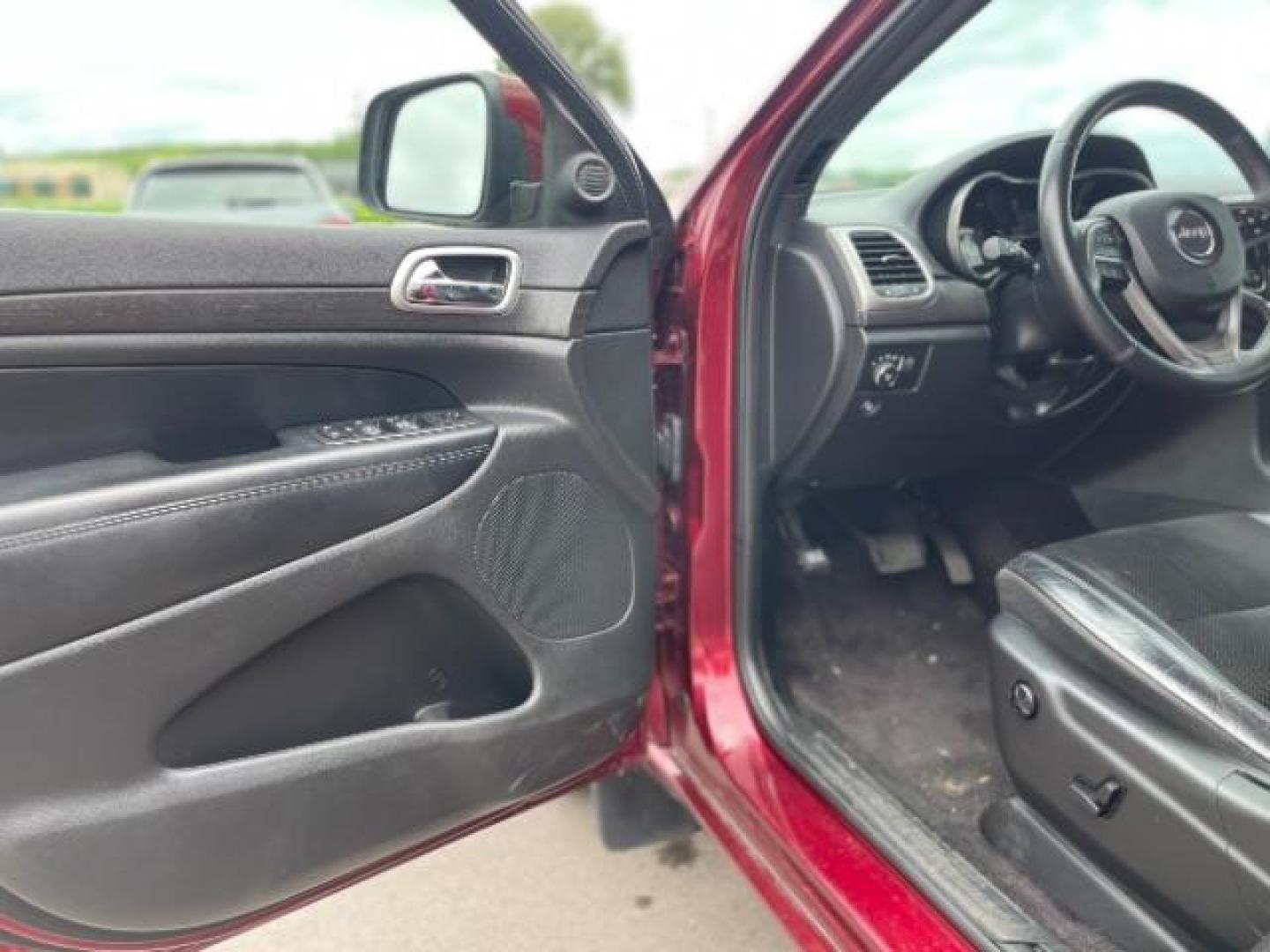 2018 Velvet Red Pearl Coat Jeep Grand Cherokee Laredo 4WD (1C4RJFAGXJC) with an 3.6L V6 DOHC 24V engine, 8-Speed Automatic transmission, located at 745 S Robert St, St. Paul, MN, 55107, (651) 222-2991, 44.923389, -93.081215 - Photo#14