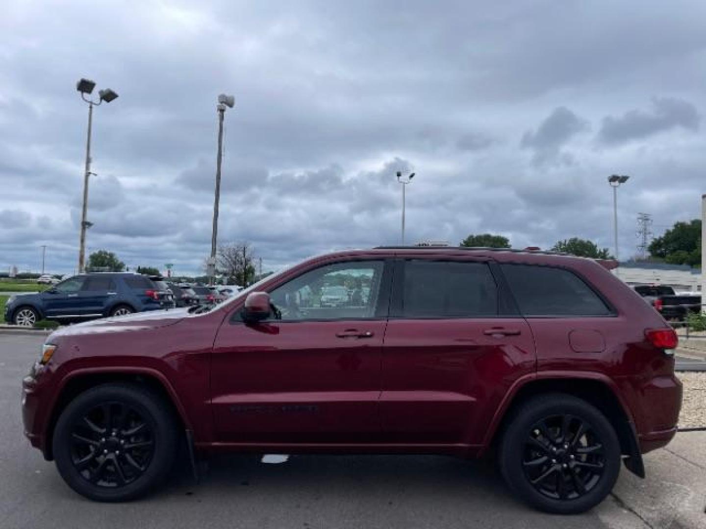 2018 Velvet Red Pearl Coat Jeep Grand Cherokee Laredo 4WD (1C4RJFAGXJC) with an 3.6L V6 DOHC 24V engine, 8-Speed Automatic transmission, located at 745 S Robert St, St. Paul, MN, 55107, (651) 222-2991, 44.923389, -93.081215 - Photo#4