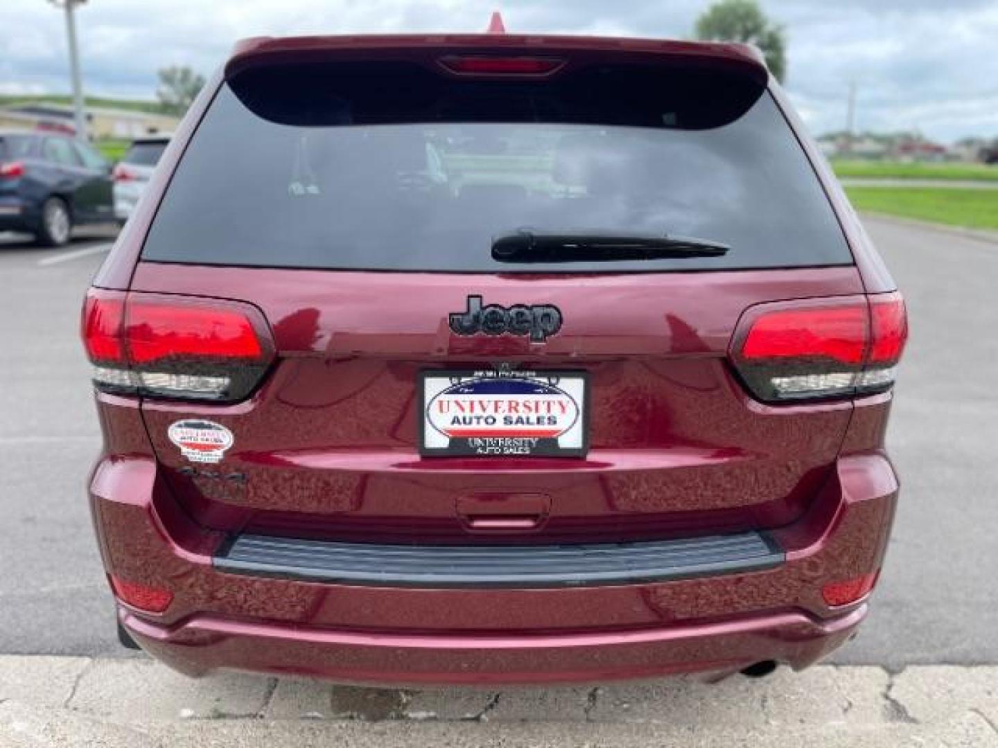 2018 Velvet Red Pearl Coat Jeep Grand Cherokee Laredo 4WD (1C4RJFAGXJC) with an 3.6L V6 DOHC 24V engine, 8-Speed Automatic transmission, located at 745 S Robert St, St. Paul, MN, 55107, (651) 222-2991, 44.923389, -93.081215 - Photo#5