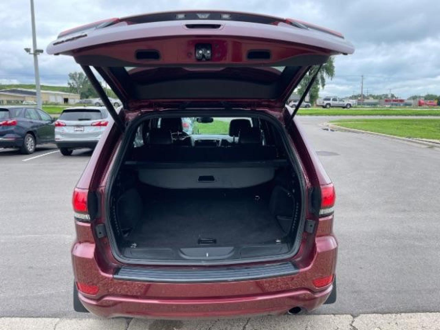 2018 Velvet Red Pearl Coat Jeep Grand Cherokee Laredo 4WD (1C4RJFAGXJC) with an 3.6L V6 DOHC 24V engine, 8-Speed Automatic transmission, located at 745 S Robert St, St. Paul, MN, 55107, (651) 222-2991, 44.923389, -93.081215 - Photo#6