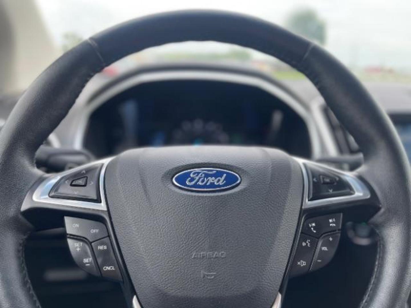 2016 Too Good To Be Blue Metallic Ford Edge Titanium AWD (2FMPK4K9XGB) with an 2.0L L4 DOHC 16V engine, 6-Speed Automatic transmission, located at 3301 W Hwy 13, Burnsville, MN, 55337, (952) 460-3200, 44.775333, -93.320808 - Photo#26