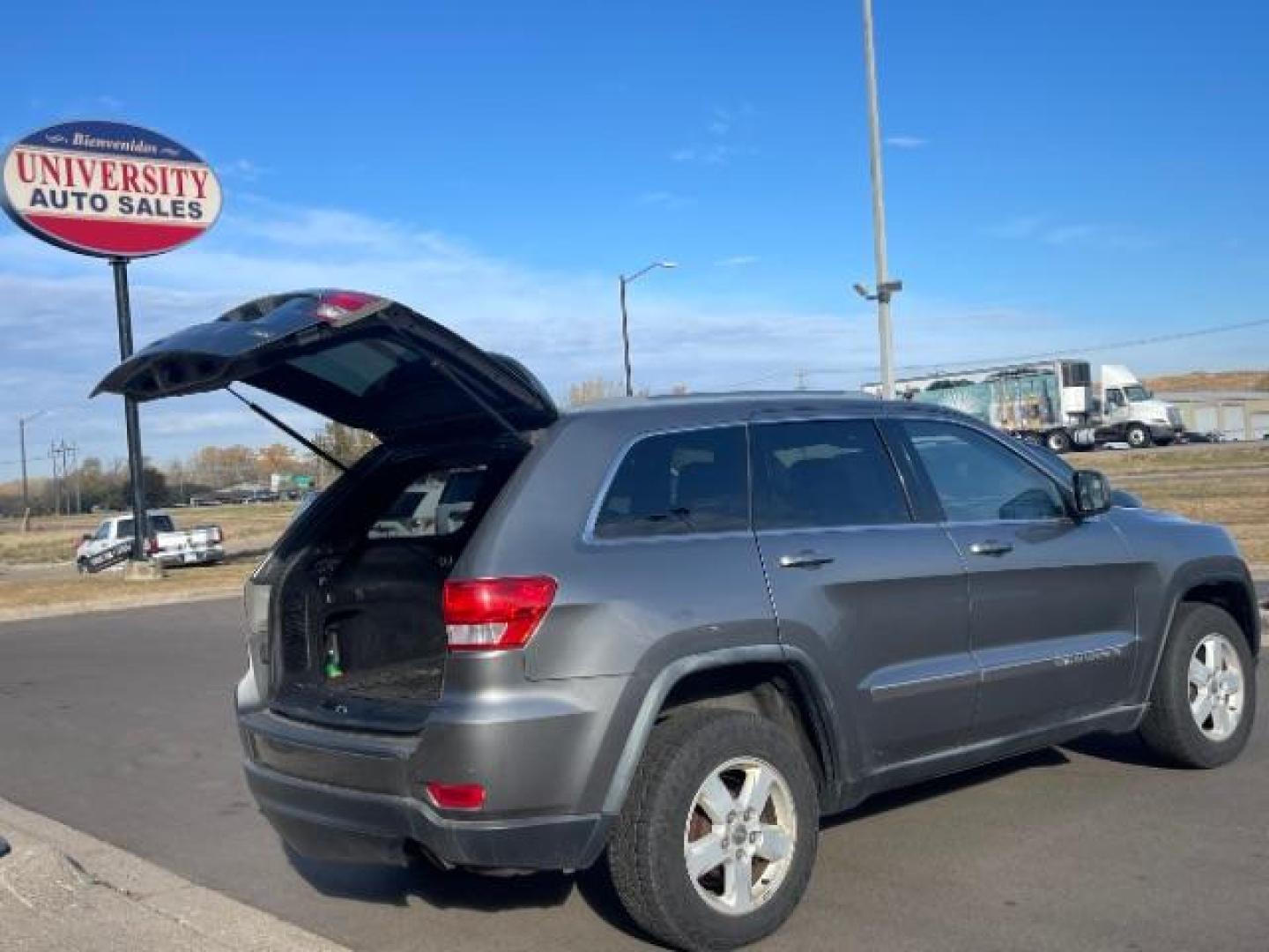 2012 Jeep Grand Cherokee Laredo 4WD (1C4RJFAGXCC) with an 3.6L V6 DOHC 24V engine, 5-Speed Automatic transmission, located at 3301 W Hwy 13, Burnsville, MN, 55337, (952) 460-3200, 44.775333, -93.320808 - Photo#4