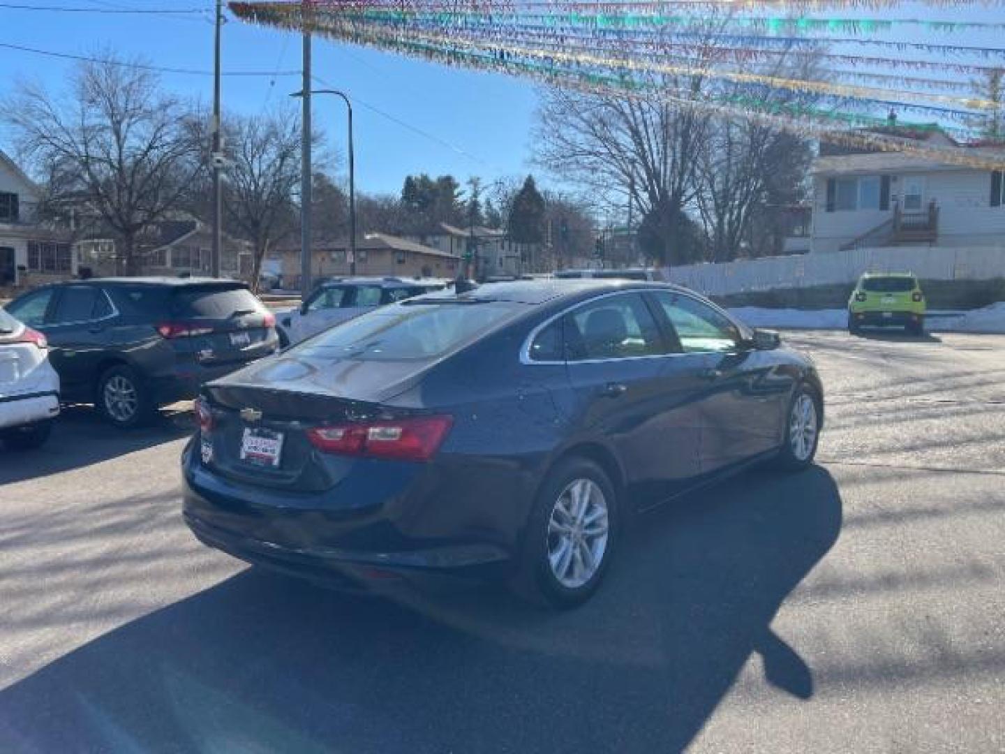 2017 Blue Velvet Metallic Chevrolet Malibu 1LT (1G1ZE5ST5HF) with an 1.5L L4 DOHC 16V engine, 6-Speed Automatic transmission, located at 745 S Robert St, St. Paul, MN, 55107, (651) 222-2991, 44.923389, -93.081215 - Photo#5