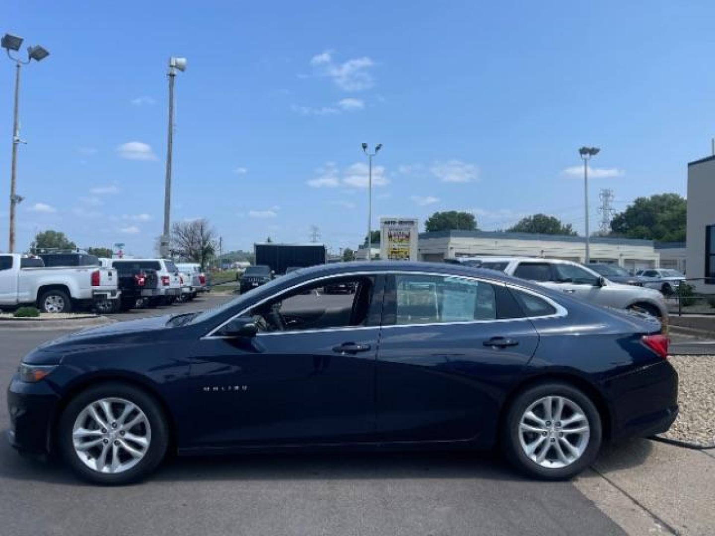 2017 Blue Velvet Metallic Chevrolet Malibu 1LT (1G1ZE5ST5HF) with an 1.5L L4 DOHC 16V engine, 6-Speed Automatic transmission, located at 745 S Robert St, St. Paul, MN, 55107, (651) 222-2991, 44.923389, -93.081215 - Photo#4