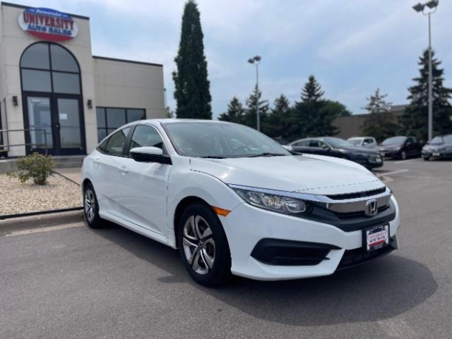 2016 Taffeta White Honda Civic LX Sedan CVT (19XFC2F58GE) with an 2.0L L4 DOHC 16V engine, Continuously Variable Transmission transmission, located at 745 S Robert St, St. Paul, MN, 55107, (651) 222-2991, 44.923389, -93.081215 - Photo#0