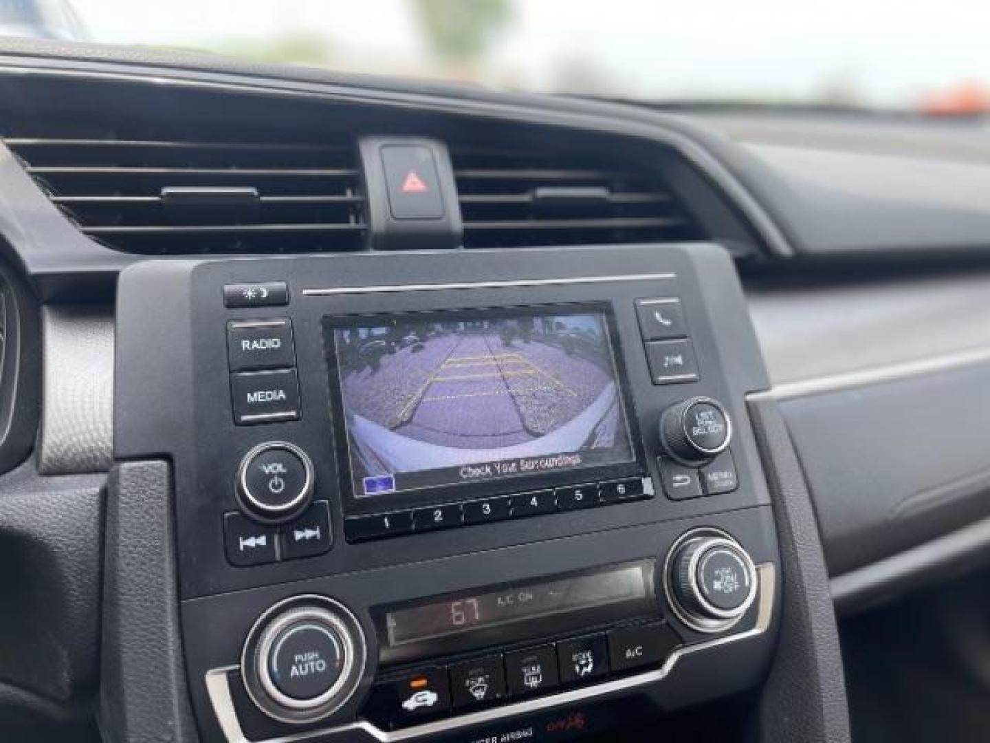 2016 Taffeta White Honda Civic LX Sedan CVT (19XFC2F58GE) with an 2.0L L4 DOHC 16V engine, Continuously Variable Transmission transmission, located at 745 S Robert St, St. Paul, MN, 55107, (651) 222-2991, 44.923389, -93.081215 - Photo#18