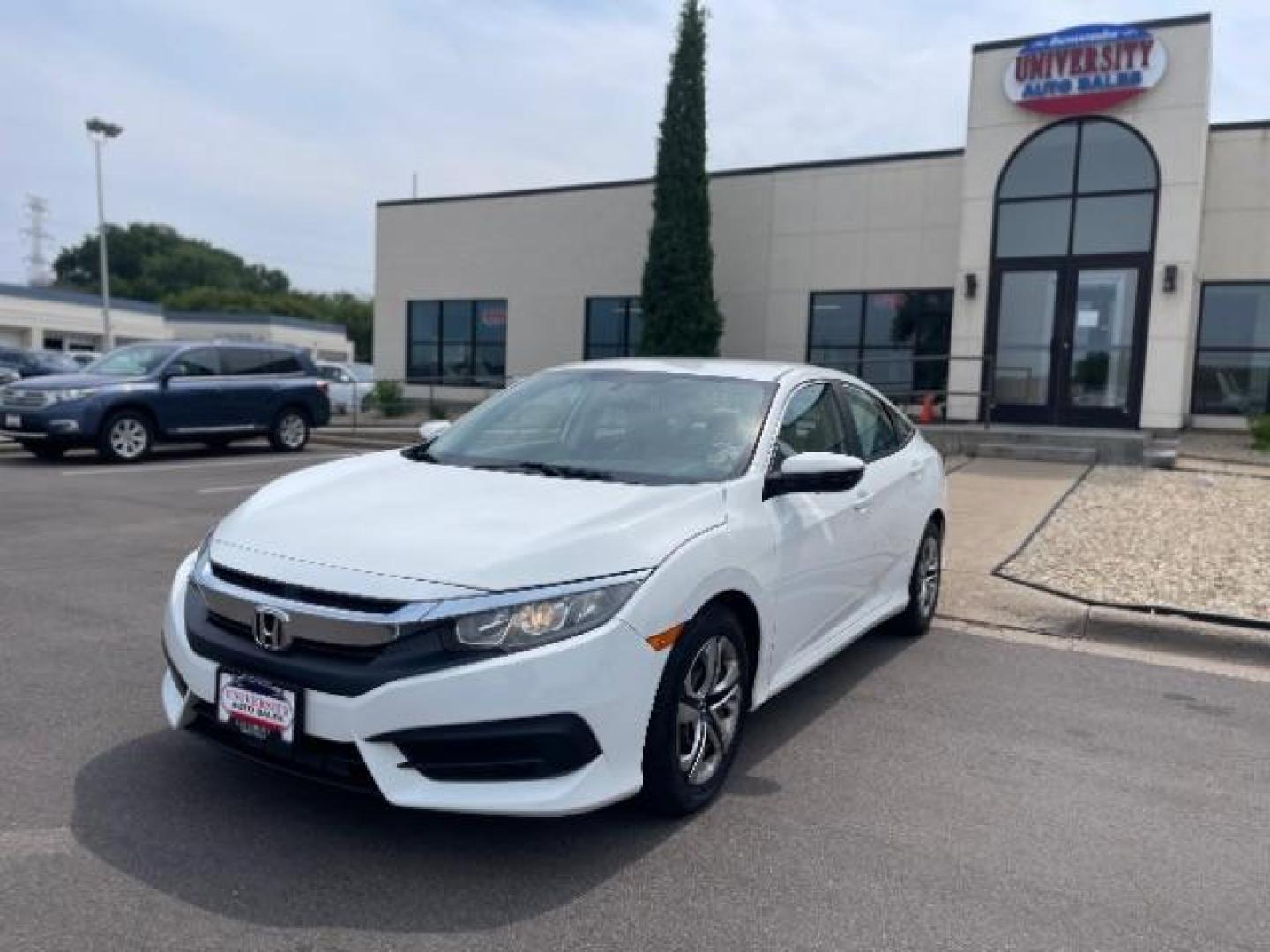 2016 Taffeta White Honda Civic LX Sedan CVT (19XFC2F58GE) with an 2.0L L4 DOHC 16V engine, Continuously Variable Transmission transmission, located at 745 S Robert St, St. Paul, MN, 55107, (651) 222-2991, 44.923389, -93.081215 - Photo#1