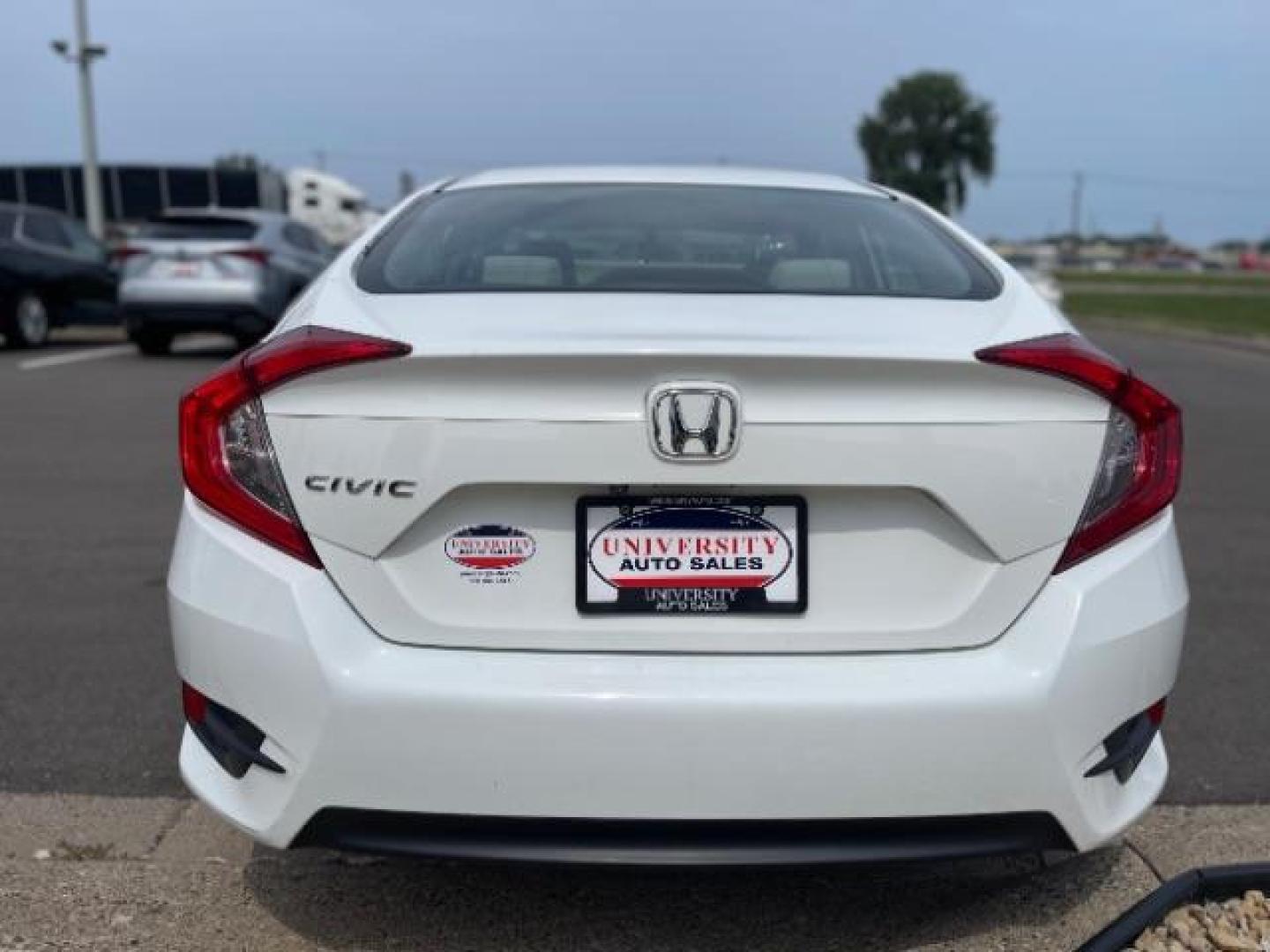 2016 Taffeta White Honda Civic LX Sedan CVT (19XFC2F58GE) with an 2.0L L4 DOHC 16V engine, Continuously Variable Transmission transmission, located at 745 S Robert St, St. Paul, MN, 55107, (651) 222-2991, 44.923389, -93.081215 - Photo#3