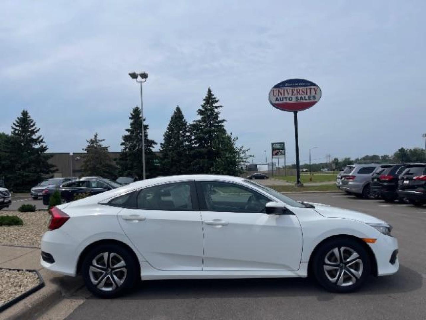 2016 Taffeta White Honda Civic LX Sedan CVT (19XFC2F58GE) with an 2.0L L4 DOHC 16V engine, Continuously Variable Transmission transmission, located at 745 S Robert St, St. Paul, MN, 55107, (651) 222-2991, 44.923389, -93.081215 - Photo#6