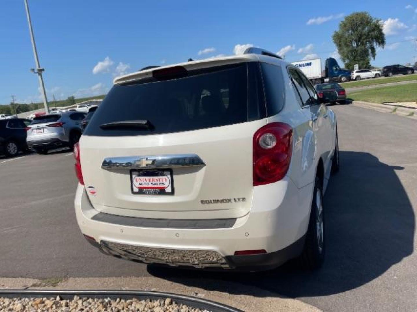 2014 Summit White Chevrolet Equinox LTZ 2WD (1GNALDEK5EZ) with an 2.4L L4 DOHC 16V FFV engine, 6-Speed Automatic transmission, located at 745 S Robert St, St. Paul, MN, 55107, (651) 222-2991, 44.923389, -93.081215 - Photo#4