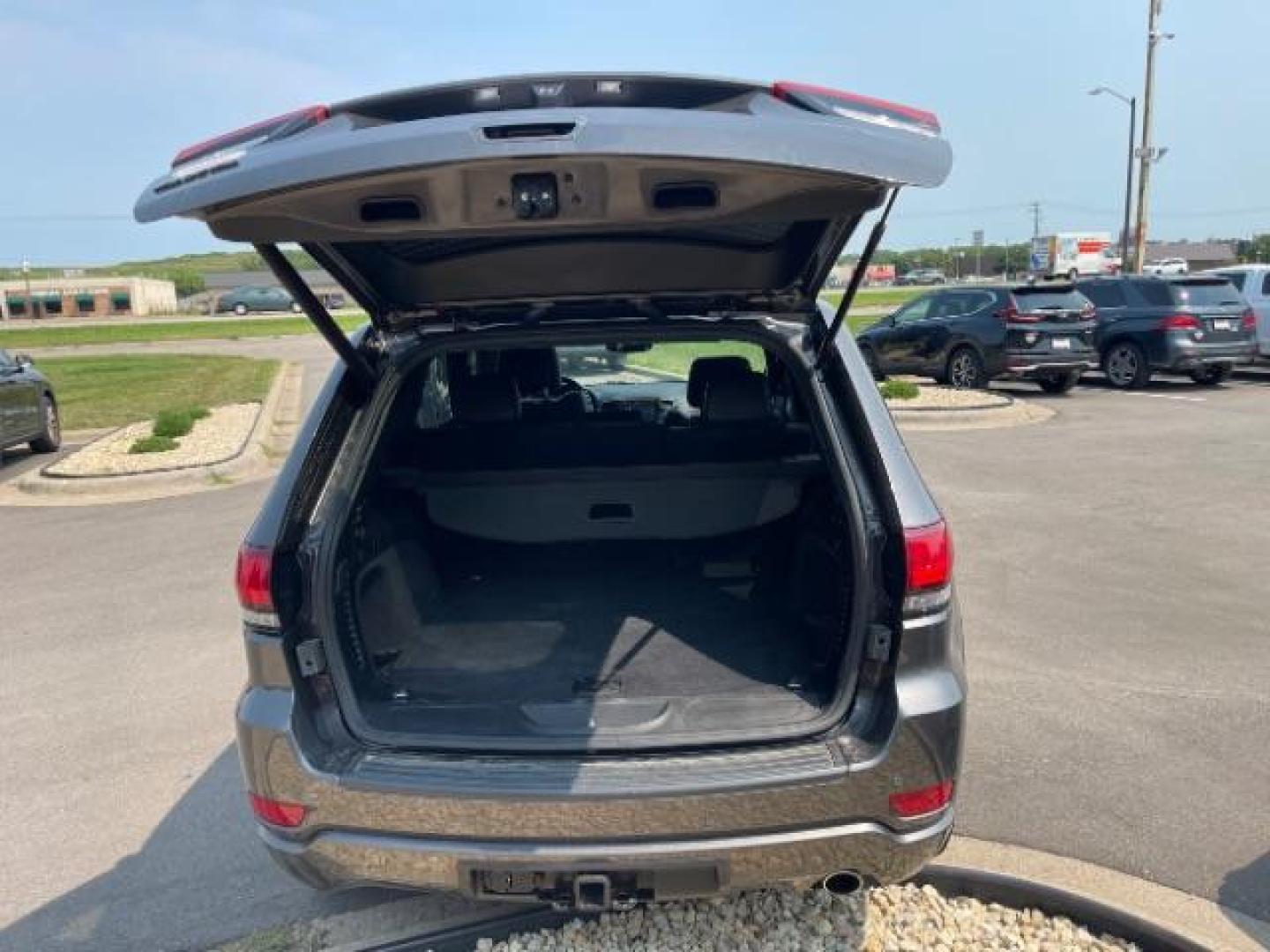 2019 Billet Silver Metallic Clear Coat Jeep Grand Cherokee Laredo 4WD (1C4RJFAG6KC) with an 3.6L V6 DOHC 24V engine, 8-Speed Automatic transmission, located at 745 S Robert St, St. Paul, MN, 55107, (651) 222-2991, 44.923389, -93.081215 - Photo#14