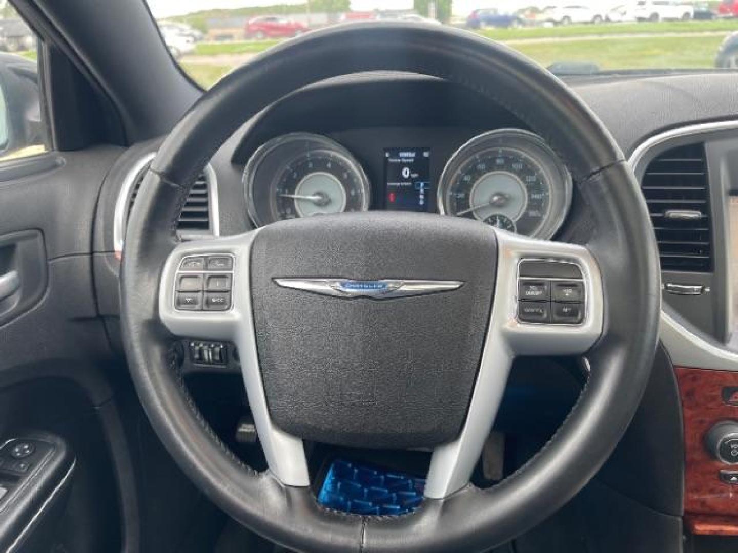 2014 Gloss Black Chrysler 300 RWD (2C3CCAAG2EH) with an 3.6L V6 SOHC 24V engine, 8-Speed Automatic transmission, located at 745 S Robert St, St. Paul, MN, 55107, (651) 222-2991, 44.923389, -93.081215 - Photo#12