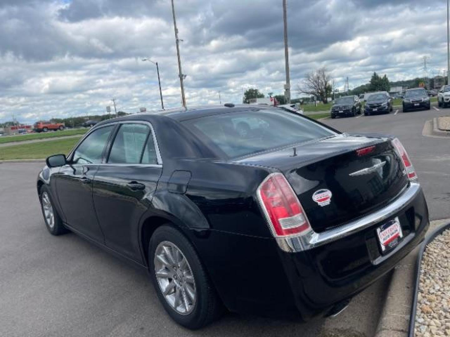 2014 Gloss Black Chrysler 300 RWD (2C3CCAAG2EH) with an 3.6L V6 SOHC 24V engine, 8-Speed Automatic transmission, located at 745 S Robert St, St. Paul, MN, 55107, (651) 222-2991, 44.923389, -93.081215 - Photo#5