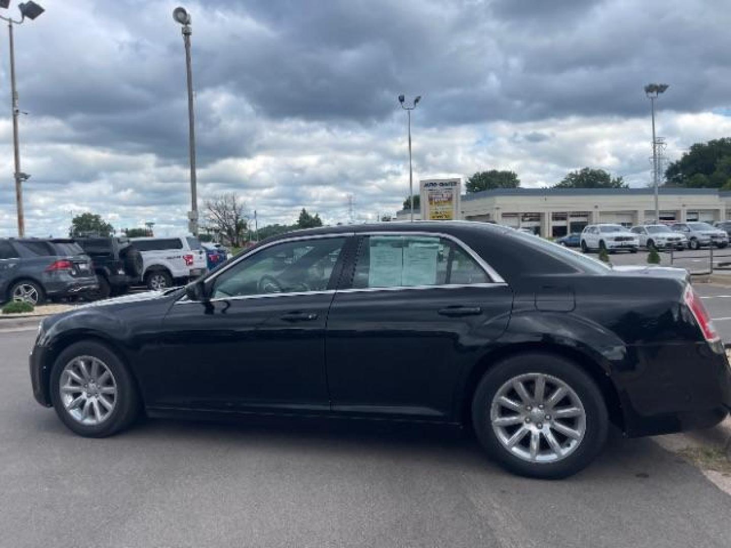 2014 Gloss Black Chrysler 300 RWD (2C3CCAAG2EH) with an 3.6L V6 SOHC 24V engine, 8-Speed Automatic transmission, located at 745 S Robert St, St. Paul, MN, 55107, (651) 222-2991, 44.923389, -93.081215 - Photo#6