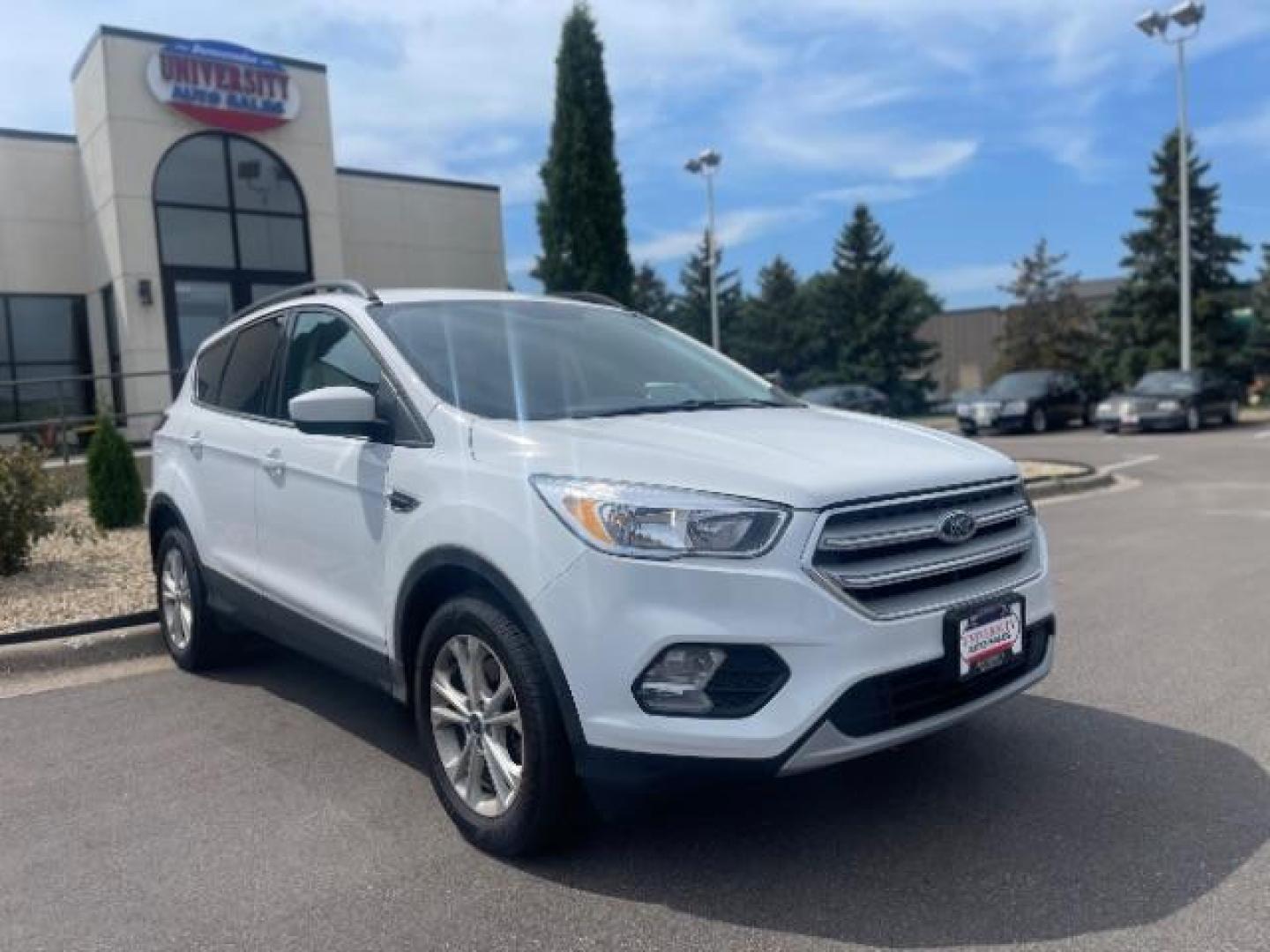 2018 Oxford White Ford Escape SE 4WD (1FMCU9G93JU) with an 2.0L L4 DOHC 16V engine, 6-Speed Automatic transmission, located at 3301 W Hwy 13, Burnsville, MN, 55337, (952) 460-3200, 44.775333, -93.320808 - Photo#0