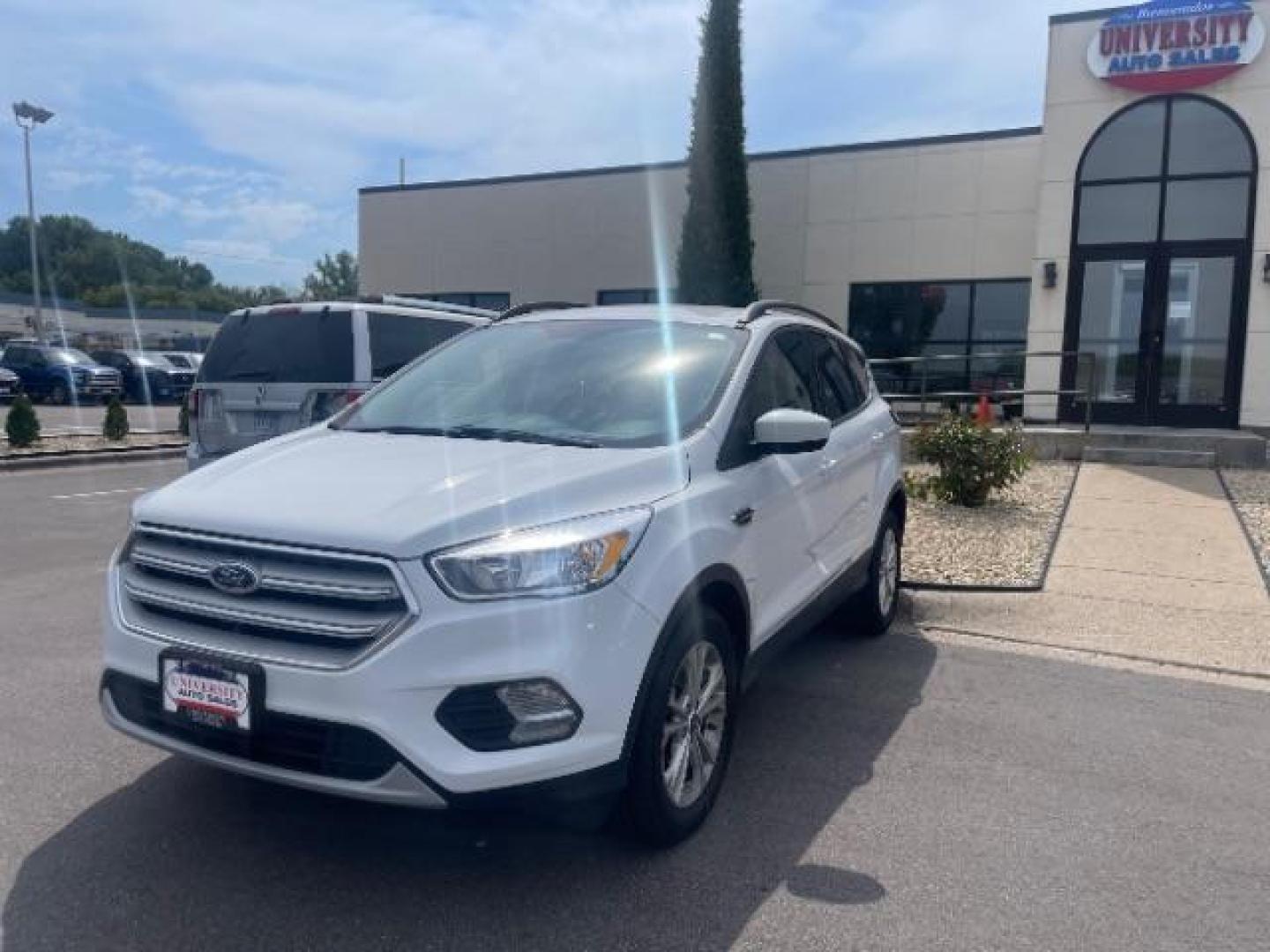 2018 Oxford White Ford Escape SE 4WD (1FMCU9G93JU) with an 2.0L L4 DOHC 16V engine, 6-Speed Automatic transmission, located at 3301 W Hwy 13, Burnsville, MN, 55337, (952) 460-3200, 44.775333, -93.320808 - Photo#2