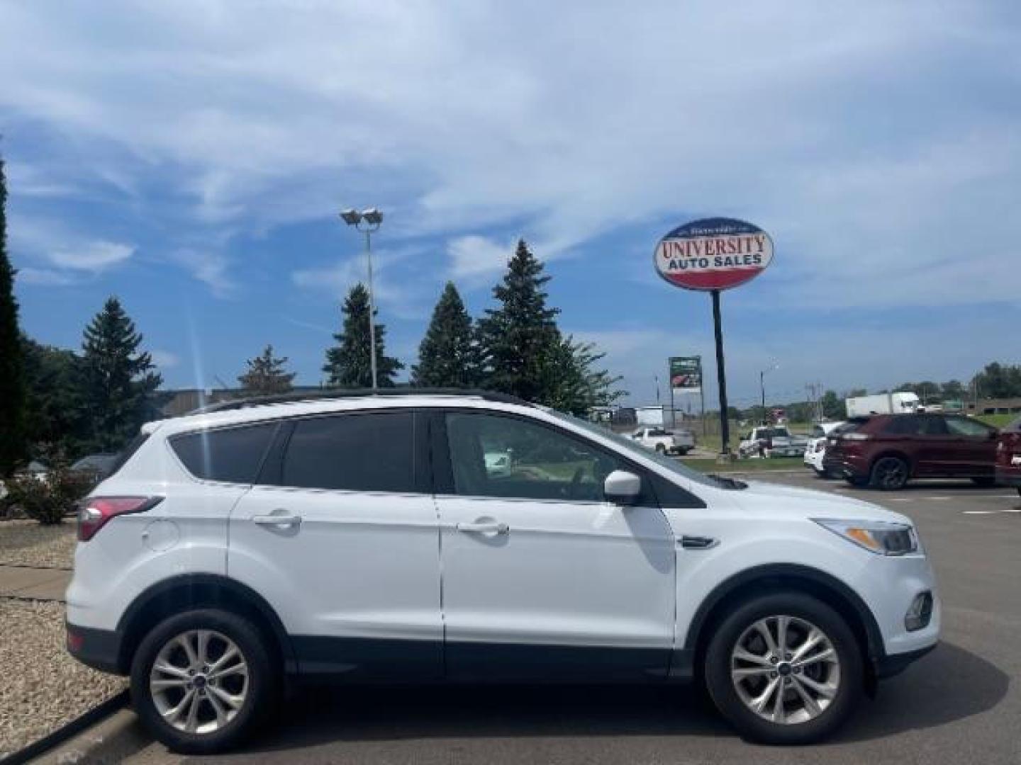 2018 Oxford White Ford Escape SE 4WD (1FMCU9G93JU) with an 2.0L L4 DOHC 16V engine, 6-Speed Automatic transmission, located at 3301 W Hwy 13, Burnsville, MN, 55337, (952) 460-3200, 44.775333, -93.320808 - Photo#7