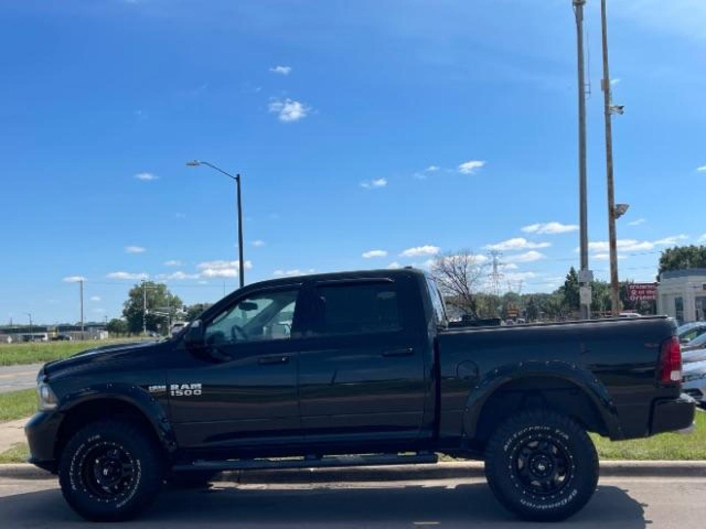 2014 Black Clearcoat RAM 1500 Sport Crew Cab SWB 4WD (1C6RR7MT6ES) with an 5.7L V8 OHV 16V engine, 8-Speed Automatic transmission, located at 3301 W Hwy 13, Burnsville, MN, 55337, (952) 460-3200, 44.775333, -93.320808 - Photo#26