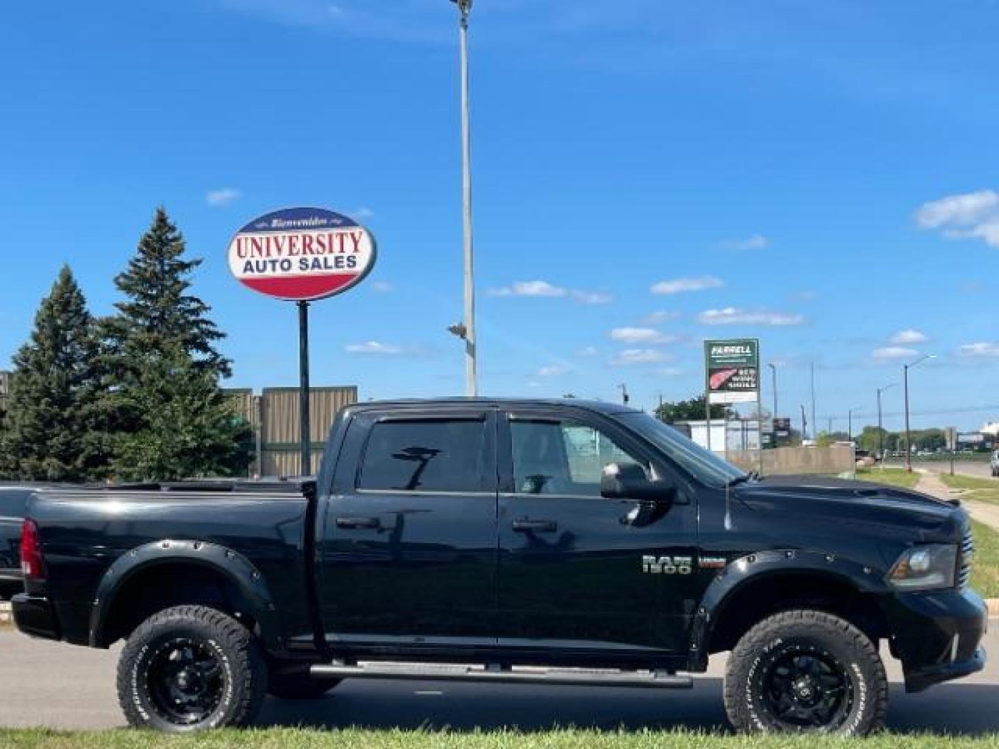 2014 Black Clearcoat RAM 1500 Sport Crew Cab SWB 4WD (1C6RR7MT6ES) with an 5.7L V8 OHV 16V engine, 8-Speed Automatic transmission, located at 3301 W Hwy 13, Burnsville, MN, 55337, (952) 460-3200, 44.775333, -93.320808 - Photo#2