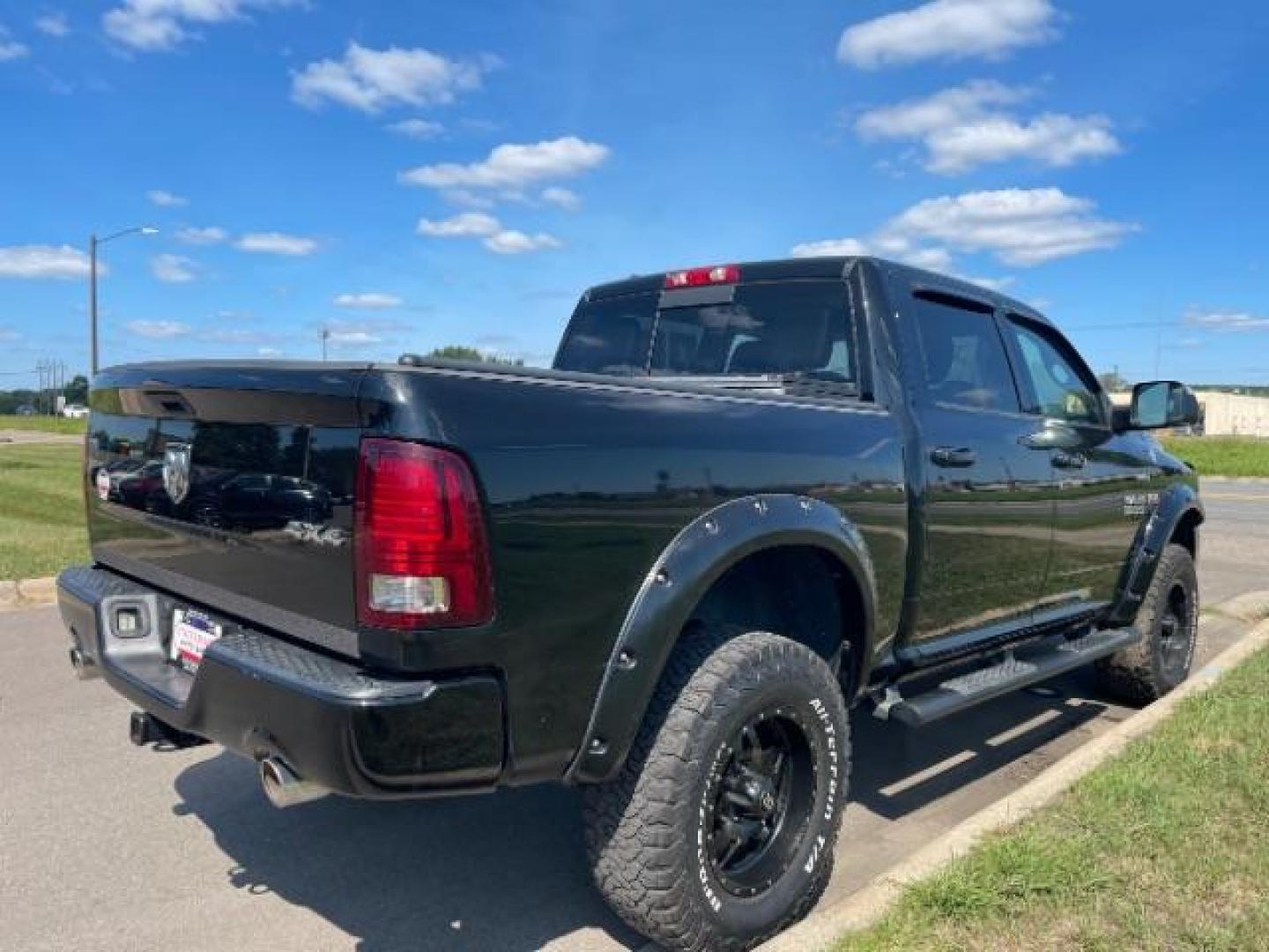 2014 Black Clearcoat RAM 1500 Sport Crew Cab SWB 4WD (1C6RR7MT6ES) with an 5.7L V8 OHV 16V engine, 8-Speed Automatic transmission, located at 3301 W Hwy 13, Burnsville, MN, 55337, (952) 460-3200, 44.775333, -93.320808 - Photo#3