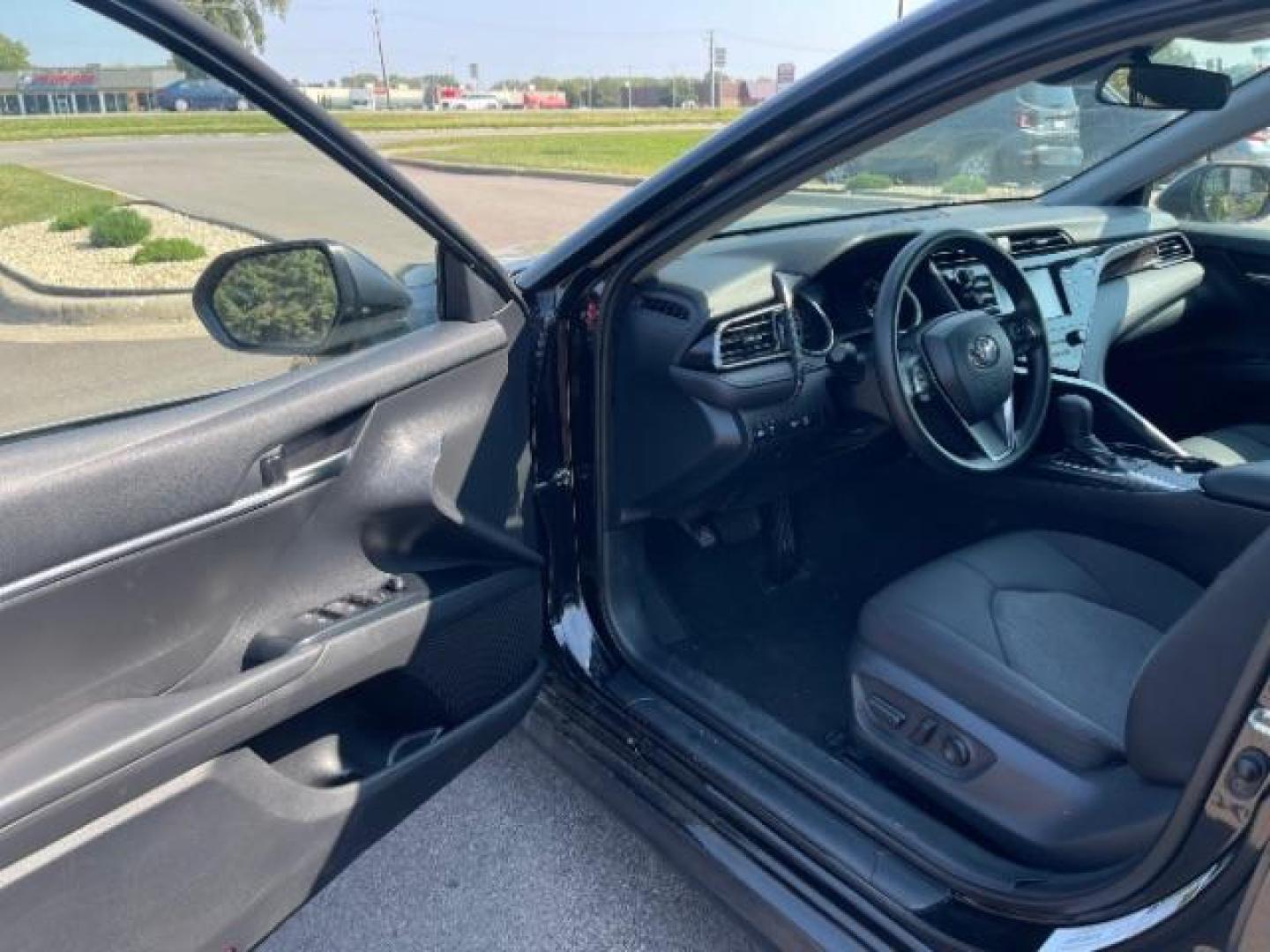 2020 Midnight Black Metallic Toyota Camry LE (4T1C11AK8LU) with an 2.5L L4 DOHC 16V engine, 8-Speed Automatic transmission, located at 745 S Robert St, St. Paul, MN, 55107, (651) 222-2991, 44.923389, -93.081215 - Photo#12