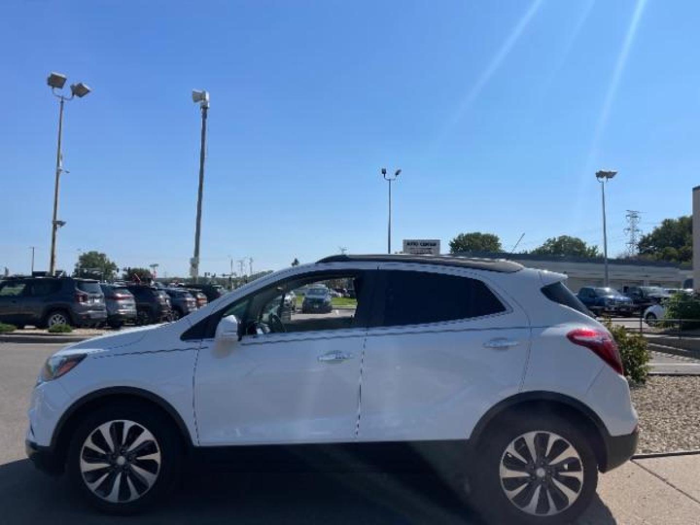 2018 Summit White/Black Carbon Metallic Buick Encore Preferred II FWD (KL4CJBSBXJB) with an 1.4L L4 DOHC 16V TURBO engine, 6-Speed Automatic transmission, located at 745 S Robert St, St. Paul, MN, 55107, (651) 222-2991, 44.923389, -93.081215 - Photo#4