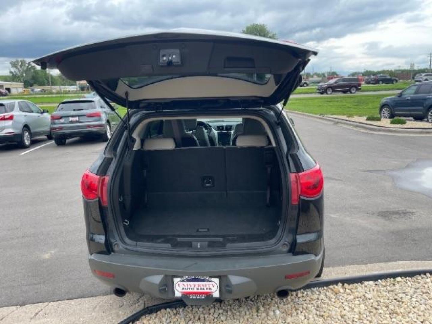 2012 Black Granite Metallic Chevrolet Traverse LTZ FWD (1GNKRLED8CJ) with an 3.6L V6 DOHC 24V engine, 6-Speed Automatic transmission, located at 745 S Robert St, St. Paul, MN, 55107, (651) 222-2991, 44.923389, -93.081215 - Photo#10