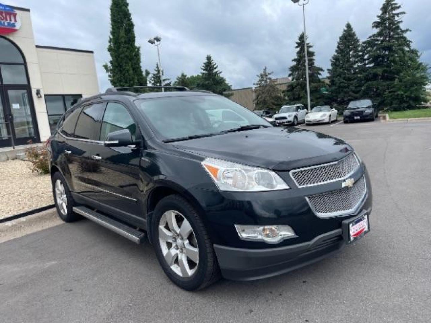 2012 Black Granite Metallic Chevrolet Traverse LTZ FWD (1GNKRLED8CJ) with an 3.6L V6 DOHC 24V engine, 6-Speed Automatic transmission, located at 745 S Robert St, St. Paul, MN, 55107, (651) 222-2991, 44.923389, -93.081215 - Photo#1