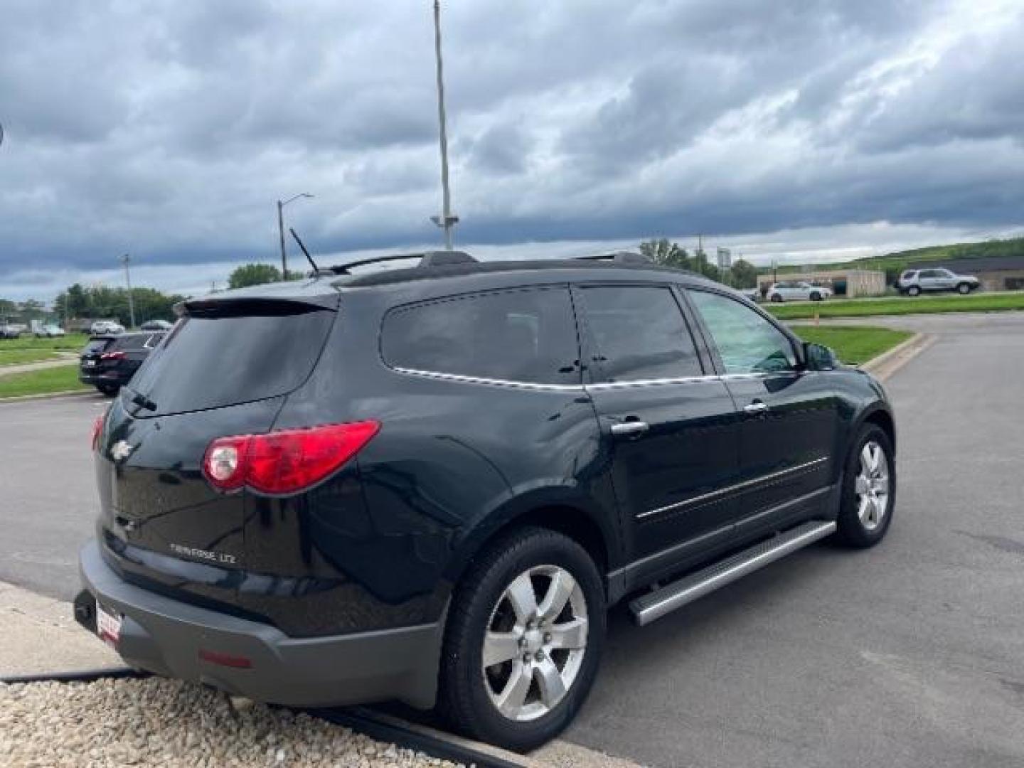 2012 Black Granite Metallic Chevrolet Traverse LTZ FWD (1GNKRLED8CJ) with an 3.6L V6 DOHC 24V engine, 6-Speed Automatic transmission, located at 745 S Robert St, St. Paul, MN, 55107, (651) 222-2991, 44.923389, -93.081215 - Photo#3