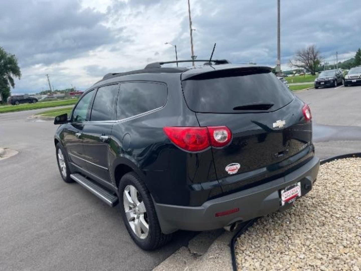 2012 Black Granite Metallic Chevrolet Traverse LTZ FWD (1GNKRLED8CJ) with an 3.6L V6 DOHC 24V engine, 6-Speed Automatic transmission, located at 745 S Robert St, St. Paul, MN, 55107, (651) 222-2991, 44.923389, -93.081215 - Photo#5