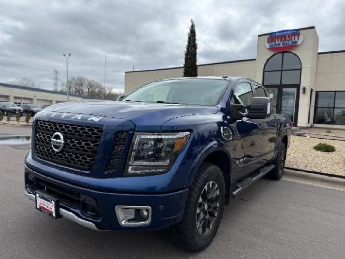 2017 Deep Blue Pearl Nissan Titan PRO-4X Crew Cab 4WD (1N6AA1E58HN) with an 5.6L V8 DOHC 32V engine, 6-Speed Automatic transmission, located at 3301 W Hwy 13, Burnsville, MN, 55337, (952) 460-3200, 44.775333, -93.320808 - Photo#0