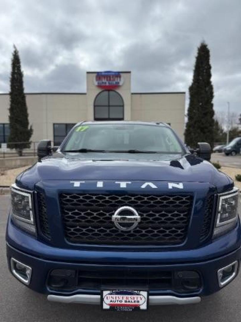 2017 Deep Blue Pearl Nissan Titan PRO-4X Crew Cab 4WD (1N6AA1E58HN) with an 5.6L V8 DOHC 32V engine, 6-Speed Automatic transmission, located at 3301 W Hwy 13, Burnsville, MN, 55337, (952) 460-3200, 44.775333, -93.320808 - Photo#1