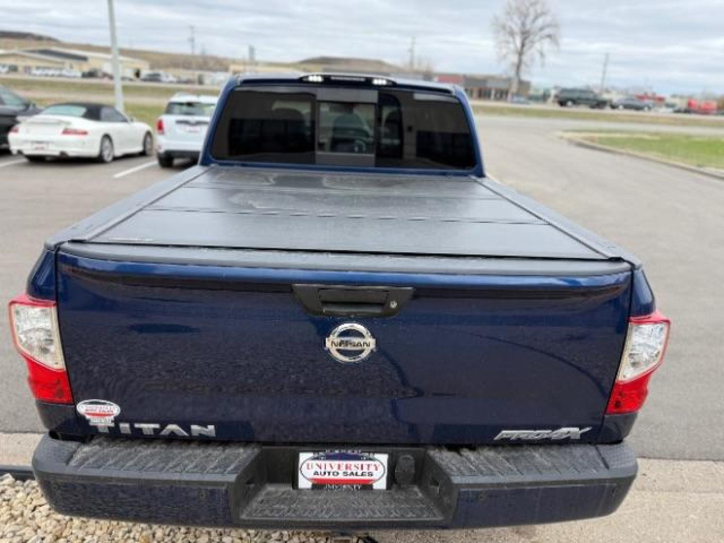 2017 Deep Blue Pearl Nissan Titan PRO-4X Crew Cab 4WD (1N6AA1E58HN) with an 5.6L V8 DOHC 32V engine, 6-Speed Automatic transmission, located at 3301 W Hwy 13, Burnsville, MN, 55337, (952) 460-3200, 44.775333, -93.320808 - Photo#9