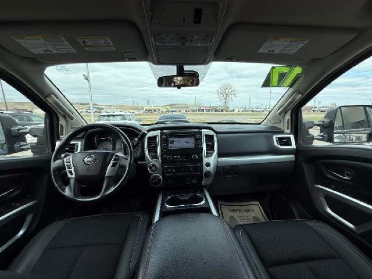 2017 Deep Blue Pearl Nissan Titan PRO-4X Crew Cab 4WD (1N6AA1E58HN) with an 5.6L V8 DOHC 32V engine, 6-Speed Automatic transmission, located at 3301 W Hwy 13, Burnsville, MN, 55337, (952) 460-3200, 44.775333, -93.320808 - Photo#12