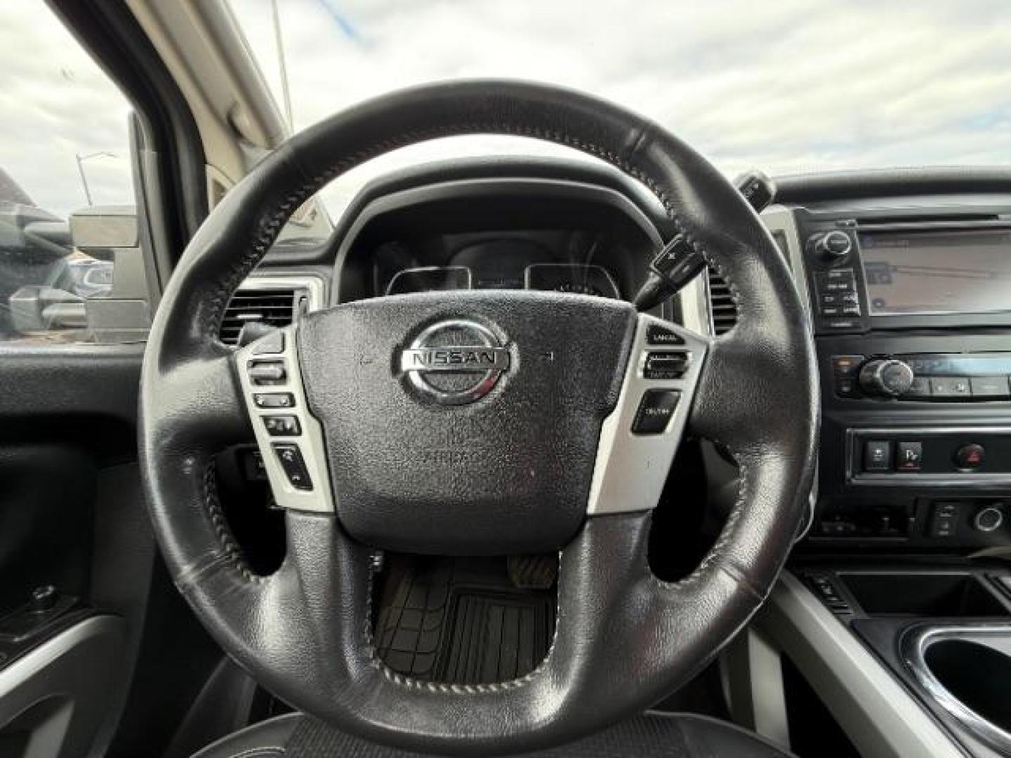 2017 Deep Blue Pearl Nissan Titan PRO-4X Crew Cab 4WD (1N6AA1E58HN) with an 5.6L V8 DOHC 32V engine, 6-Speed Automatic transmission, located at 3301 W Hwy 13, Burnsville, MN, 55337, (952) 460-3200, 44.775333, -93.320808 - Photo#13