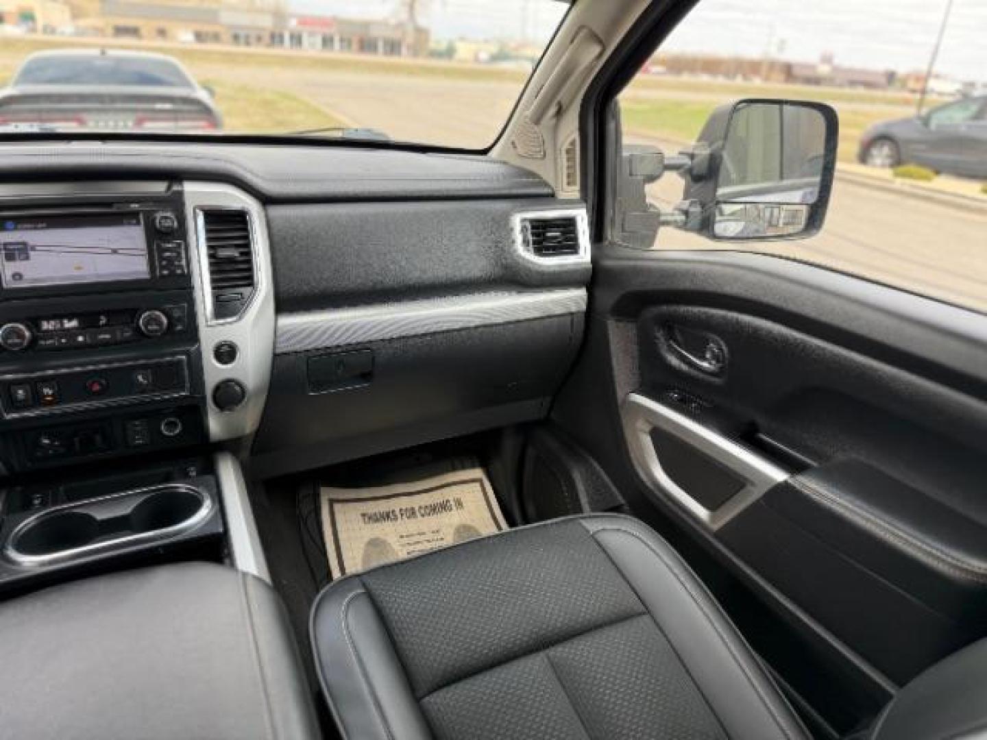 2017 Deep Blue Pearl Nissan Titan PRO-4X Crew Cab 4WD (1N6AA1E58HN) with an 5.6L V8 DOHC 32V engine, 6-Speed Automatic transmission, located at 3301 W Hwy 13, Burnsville, MN, 55337, (952) 460-3200, 44.775333, -93.320808 - Photo#17