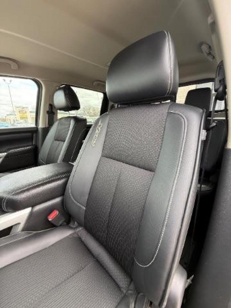 2017 Deep Blue Pearl Nissan Titan PRO-4X Crew Cab 4WD (1N6AA1E58HN) with an 5.6L V8 DOHC 32V engine, 6-Speed Automatic transmission, located at 3301 W Hwy 13, Burnsville, MN, 55337, (952) 460-3200, 44.775333, -93.320808 - Photo#19