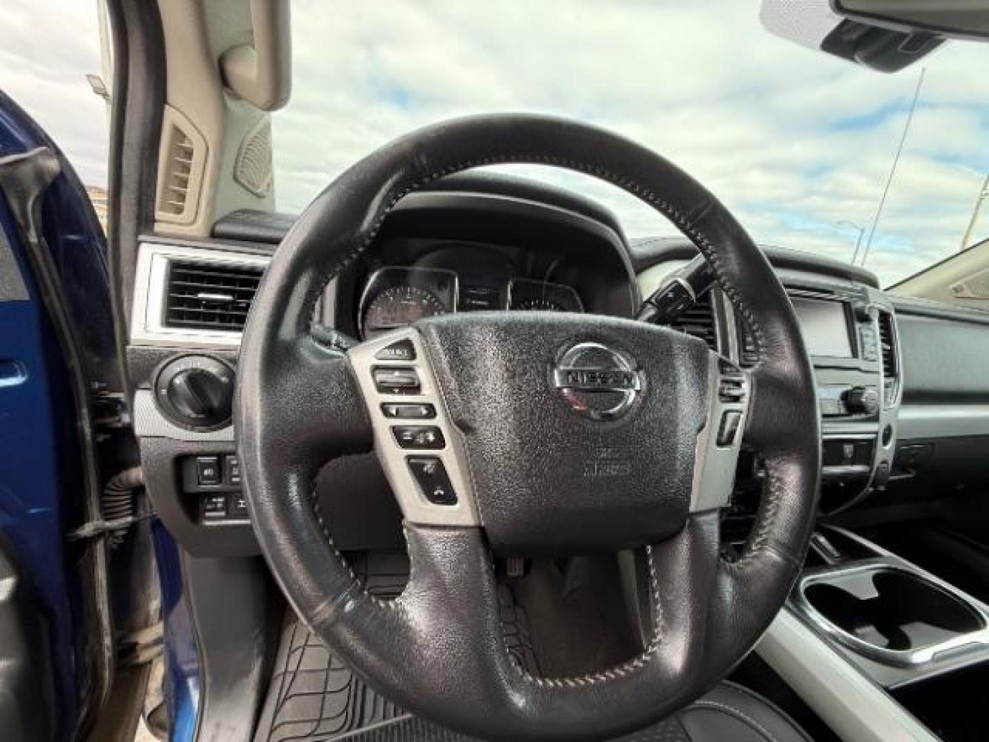 2017 Deep Blue Pearl Nissan Titan PRO-4X Crew Cab 4WD (1N6AA1E58HN) with an 5.6L V8 DOHC 32V engine, 6-Speed Automatic transmission, located at 3301 W Hwy 13, Burnsville, MN, 55337, (952) 460-3200, 44.775333, -93.320808 - Photo#23