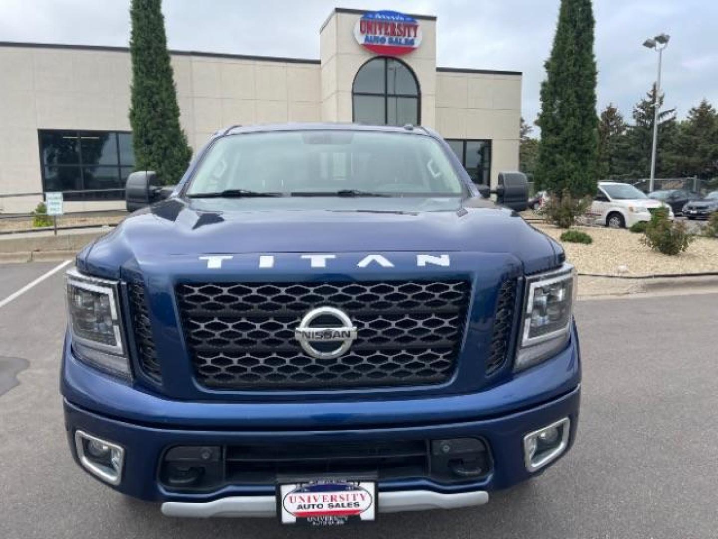 2017 Deep Blue Pearl Nissan Titan PRO-4X Crew Cab 4WD (1N6AA1E58HN) with an 5.6L V8 DOHC 32V engine, 6-Speed Automatic transmission, located at 745 S Robert St, St. Paul, MN, 55107, (651) 222-2991, 44.923389, -93.081215 - Photo#0