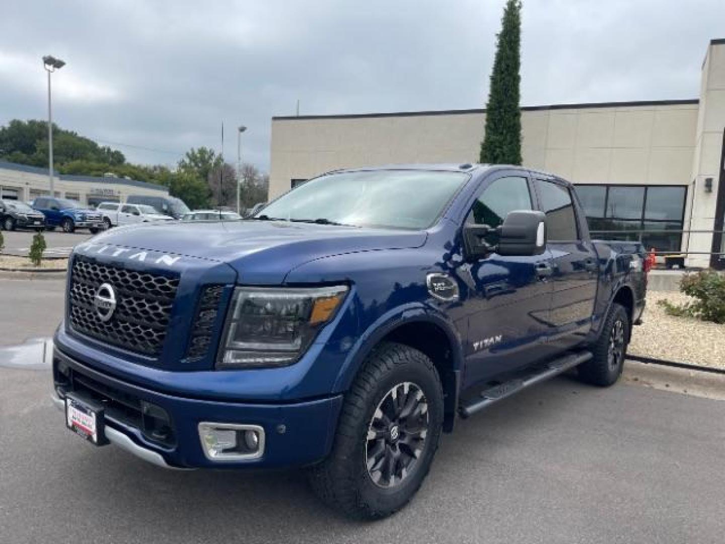 2017 Deep Blue Pearl Nissan Titan PRO-4X Crew Cab 4WD (1N6AA1E58HN) with an 5.6L V8 DOHC 32V engine, 6-Speed Automatic transmission, located at 745 S Robert St, St. Paul, MN, 55107, (651) 222-2991, 44.923389, -93.081215 - Photo#9