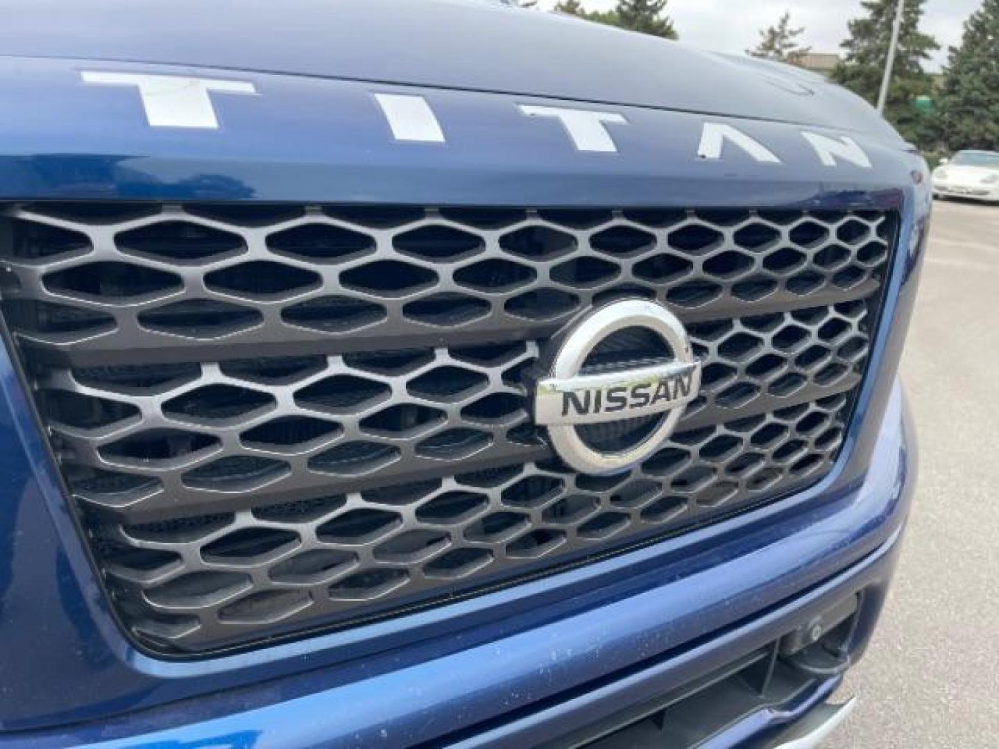 2017 Deep Blue Pearl Nissan Titan PRO-4X Crew Cab 4WD (1N6AA1E58HN) with an 5.6L V8 DOHC 32V engine, 6-Speed Automatic transmission, located at 745 S Robert St, St. Paul, MN, 55107, (651) 222-2991, 44.923389, -93.081215 - Photo#1