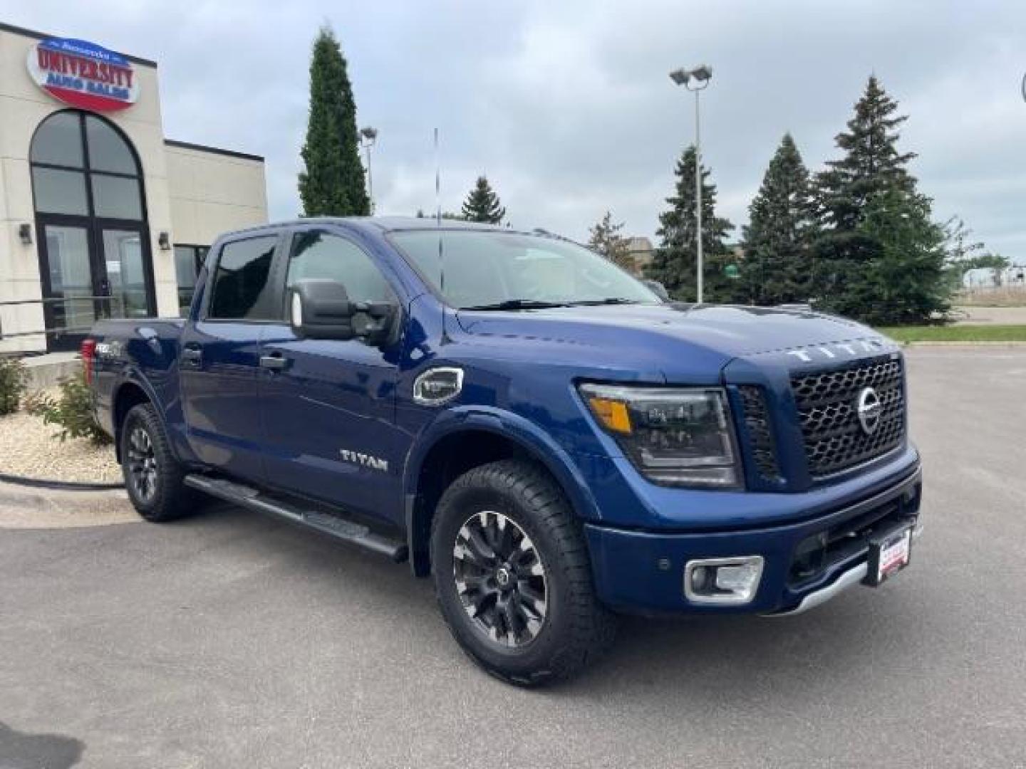 2017 Deep Blue Pearl Nissan Titan PRO-4X Crew Cab 4WD (1N6AA1E58HN) with an 5.6L V8 DOHC 32V engine, 6-Speed Automatic transmission, located at 745 S Robert St, St. Paul, MN, 55107, (651) 222-2991, 44.923389, -93.081215 - Photo#2